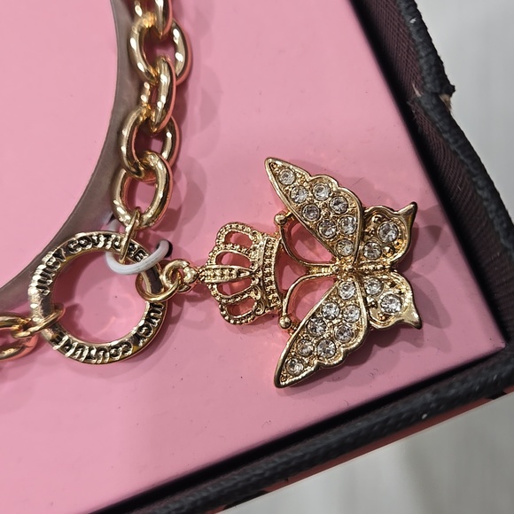 Juicy Couture Gold Bracelet with Crowned Butterfly Charm - Picture 3 of 4